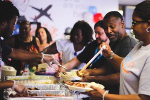 People eating in line